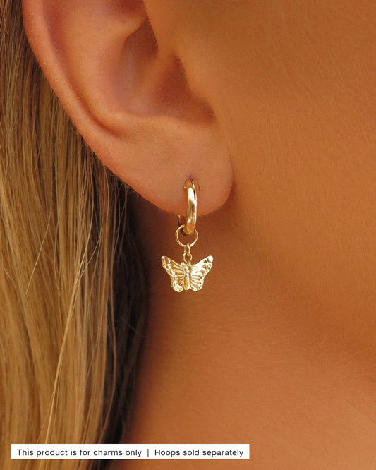 Butterfly Hoop Earring Charm worn on a 14k gold-filled Thick Hoop - ear close-up | The Littl