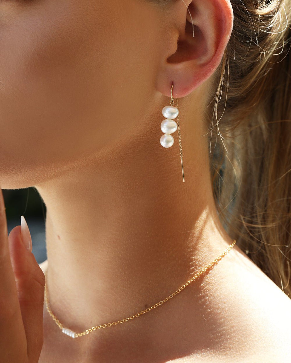 Stacked pearl earrings deals