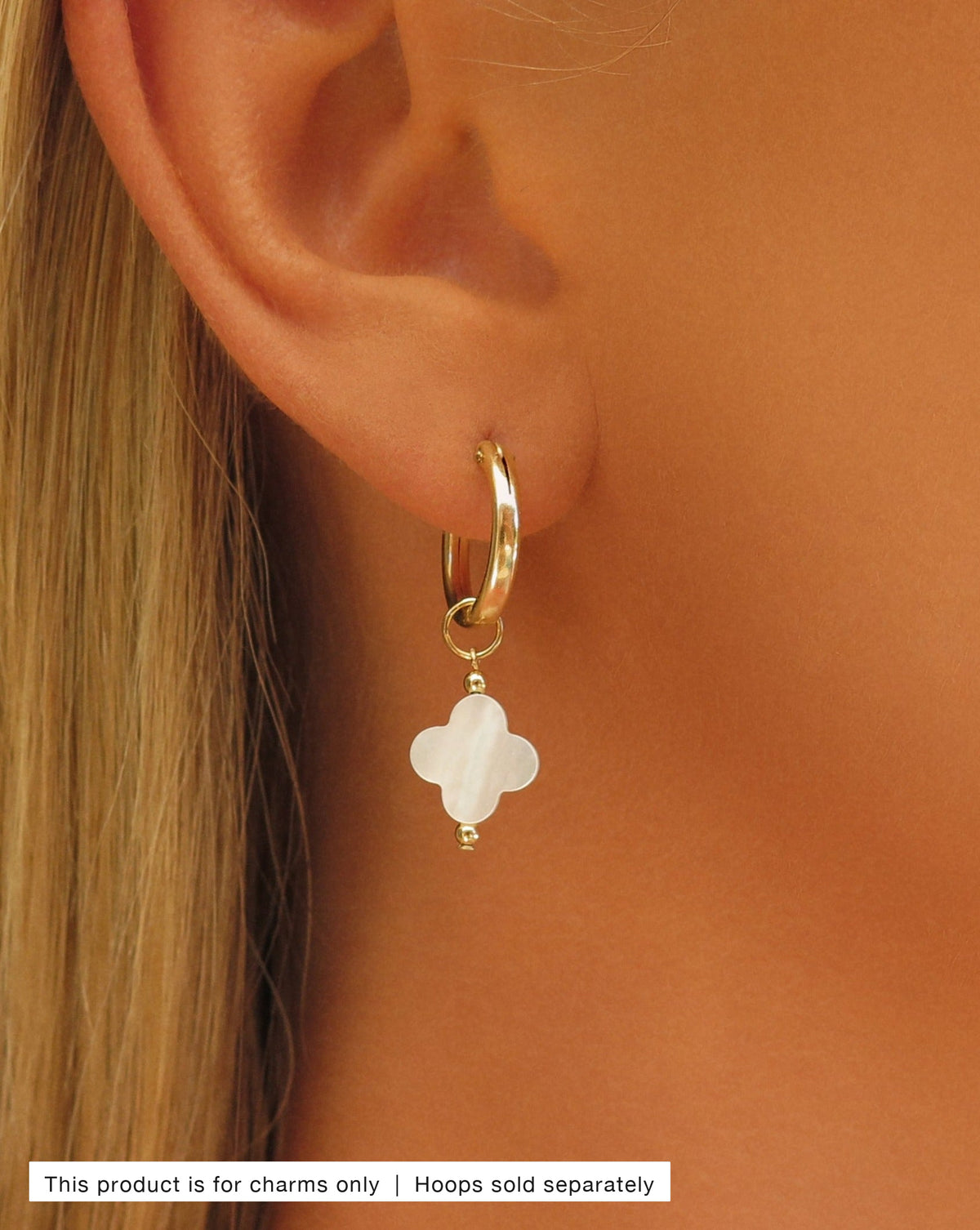 Mother of Pearl Clover Hoop Earring Charm worn on a 14k gold-filled Thick Hoop - ear close-up | The Littl
