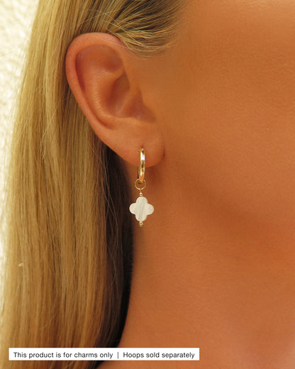 Model wearing a Mother of Pearl Clover Hoop Earring Charm on a gold Thick Hoop Earring | The Littl