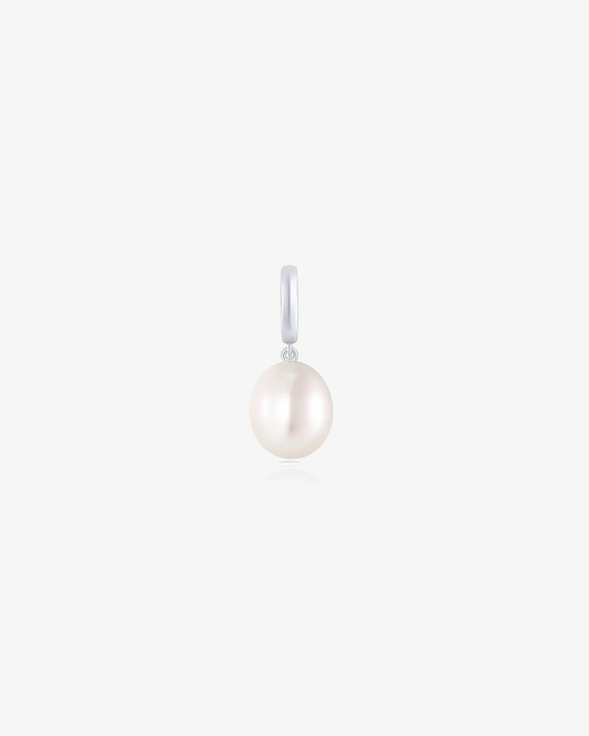 Freshwater pearl drop charm in 14k solid white gold on a light grey background