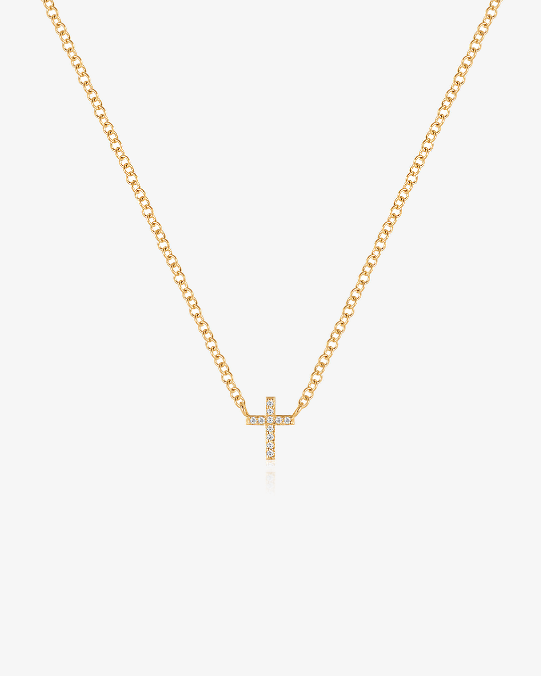 Slim pavé cross set into a 14k solid gold chain, with 11 tiny lab-grown diamonds