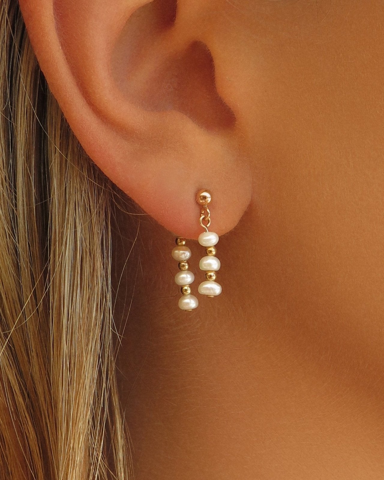 Pink pearl ear jacket dangling earrings in silver by Elsa Lee Paris